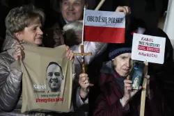 Poles vote for a new president as security concerns loom large